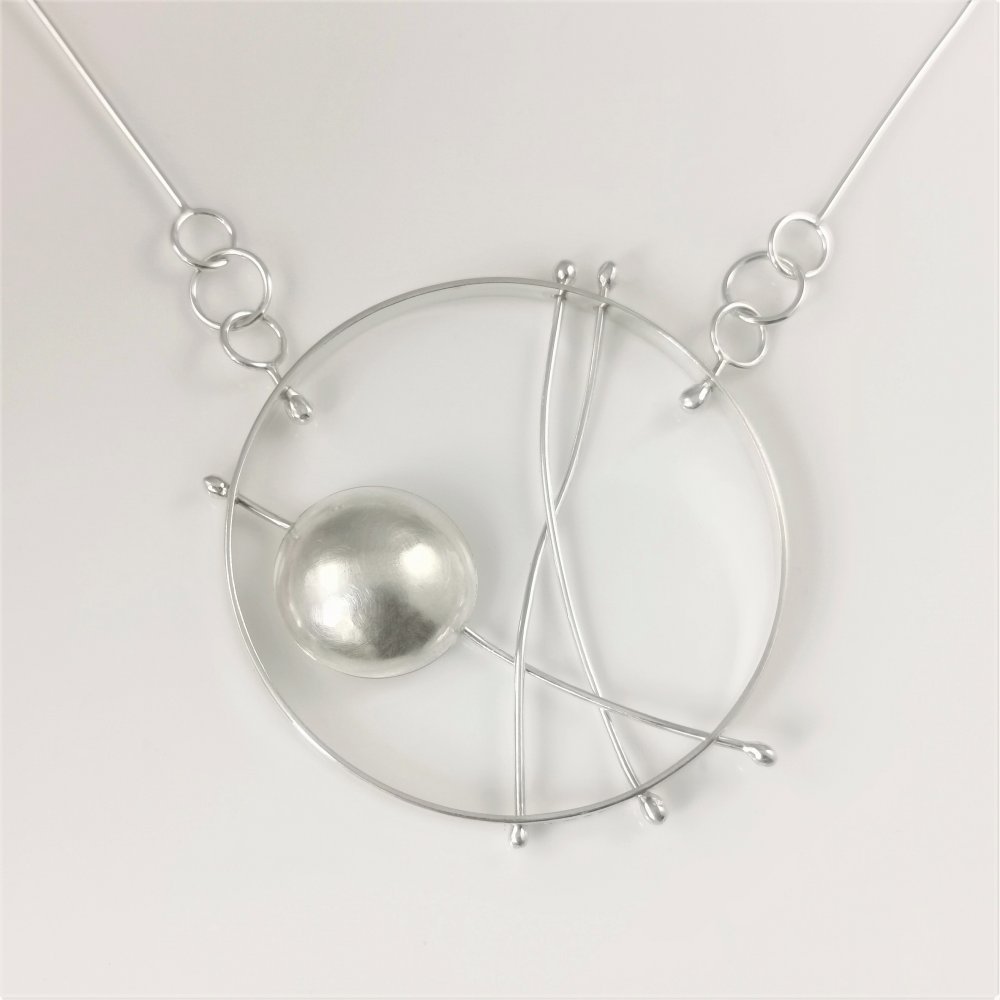 1. A Silver Vesicular Transport Pendant