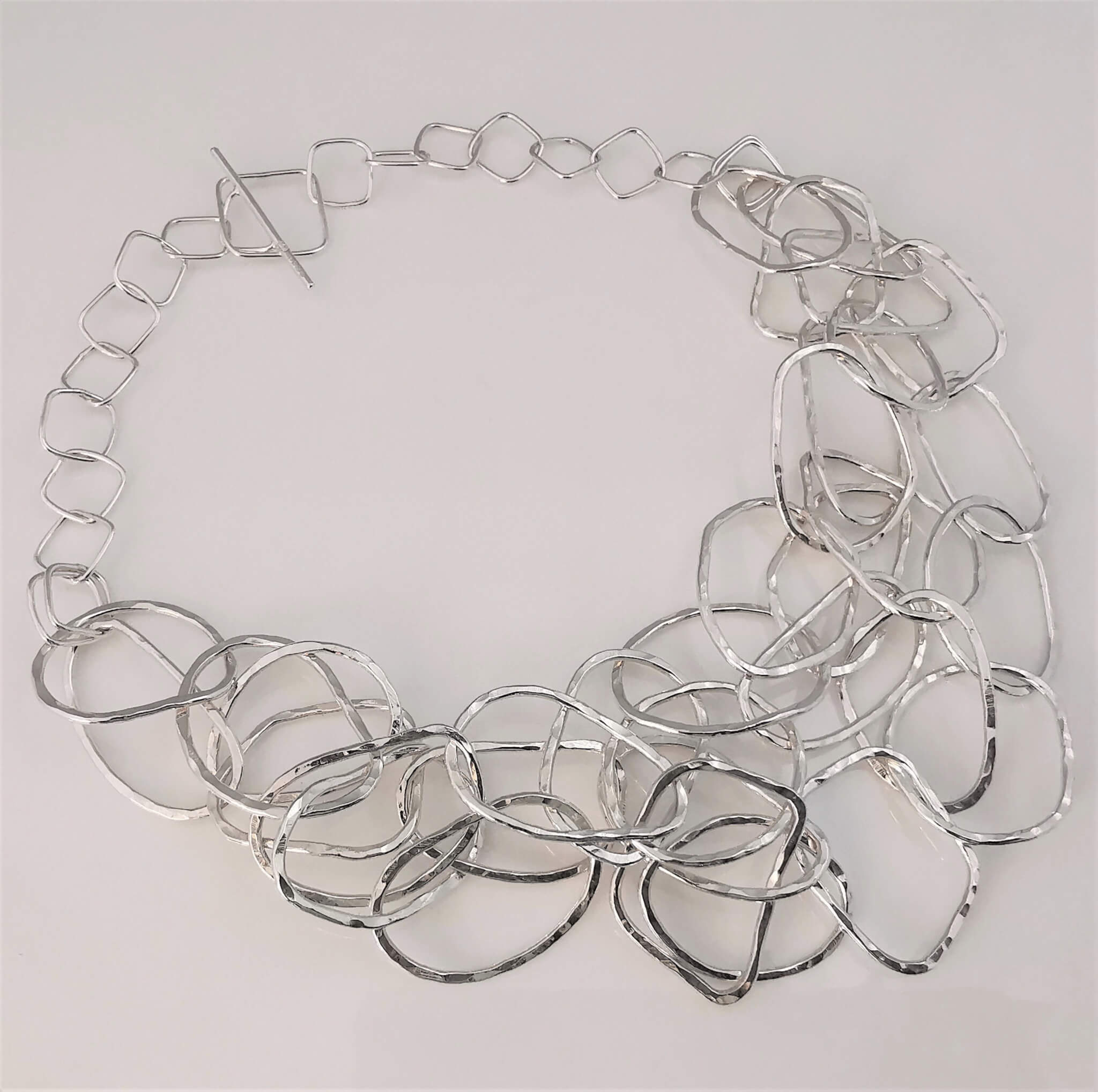 NECKLACES Silver Triple Strand Interlinking Textured Hoop Necklace